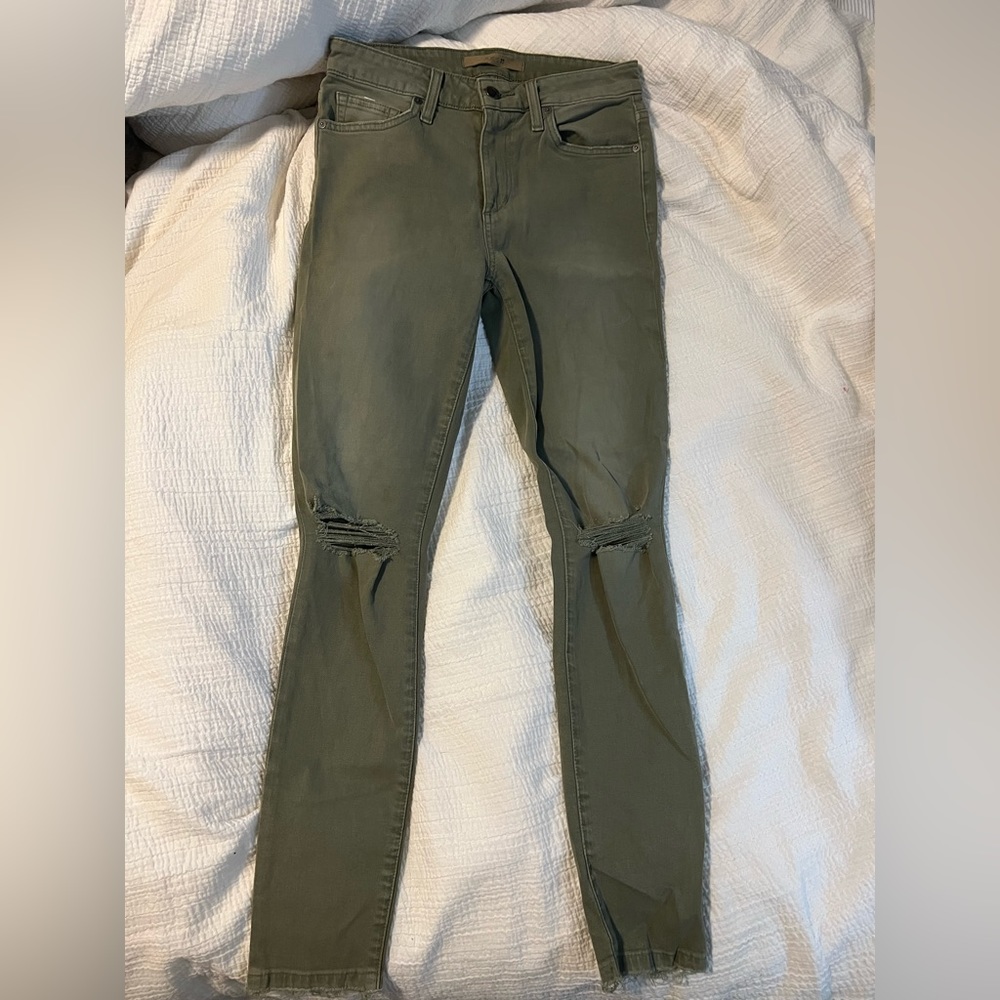 Woman’s Joe’s Jeans size 26 ankle jean with frayed hems.
